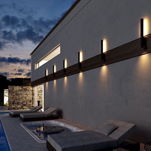 Aplique para pared que proporciona una luz indirecta (hacia la pared) así como un foco orientable.