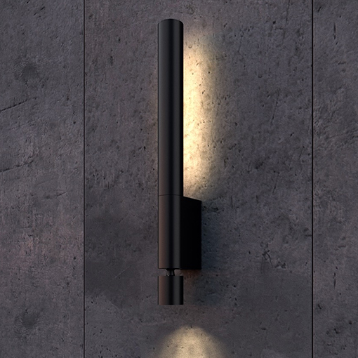 Aplique para pared que proporciona una luz indirecta (hacia la pared) así como un foco orientable.